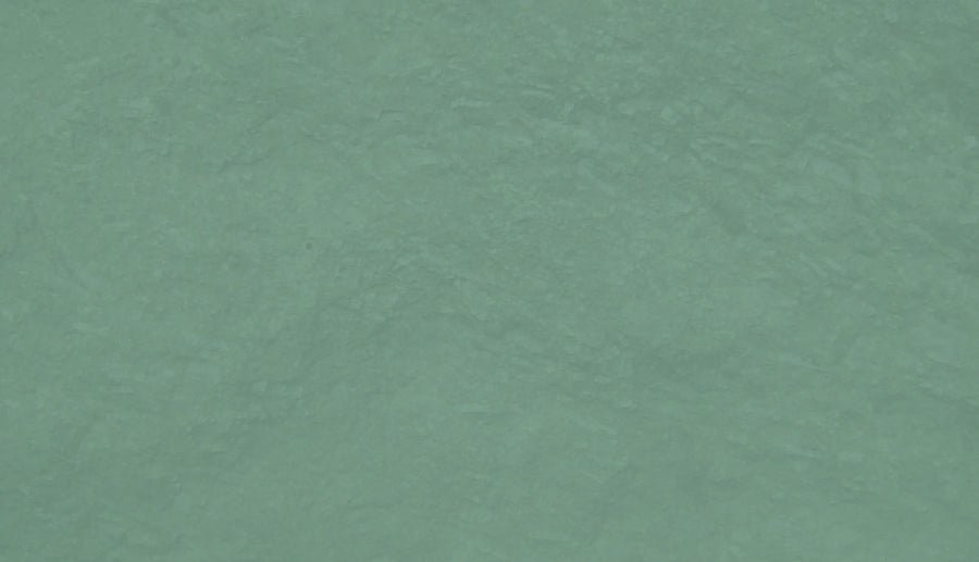 Stone texture over a pastel green